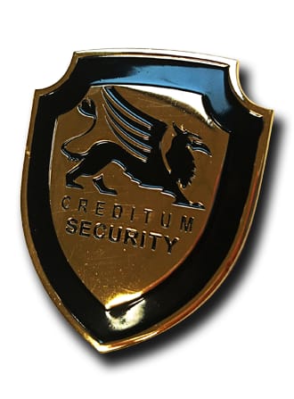 Pin in schildvorm met een griffioen, in zwart en goud