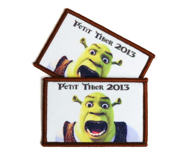 Twee rechthoekige full colour patches met een tekenfilmfiguur